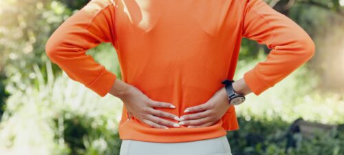 Stretching, massage and warm up with woman before running for fitness, training or exercise in park